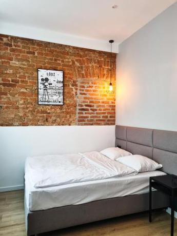 Imagen de la habitación del Hotel BOOGIE Home Kamienica Ł&oacute;dzka. Foto 18
