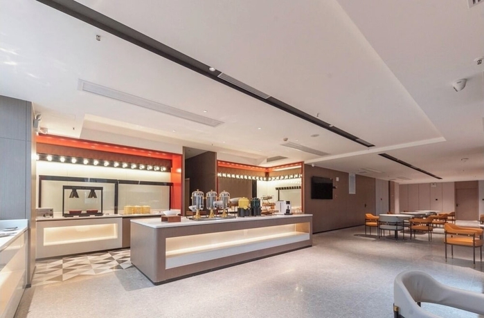 Imagen de los interiores del Hotel BORRMAN HOTEL WUZHOU. Foto 12