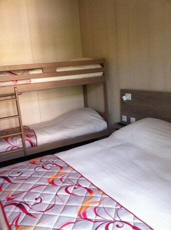 Imagen de la habitación del Hotel BRIT Confort Le Revest Sainte Maxime. Foto 14
