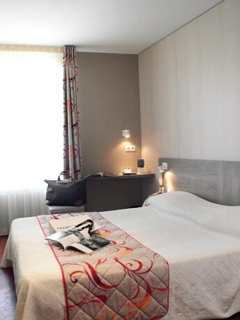 Imagen de la habitación del Hotel BRIT Confort Le Revest Sainte Maxime. Foto 20
