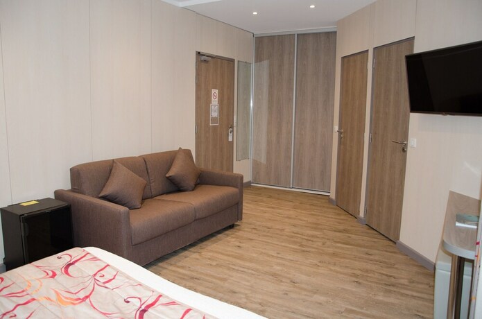 Imagen de la habitación del Hotel BRIT Confort Le Revest Sainte Maxime. Foto 25