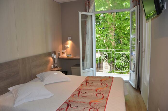 Imagen de la habitación del Hotel BRIT Confort Le Revest Sainte Maxime. Foto 28