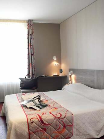 Imagen de la habitación del Hotel BRIT Confort Le Revest Sainte Maxime. Foto 29
