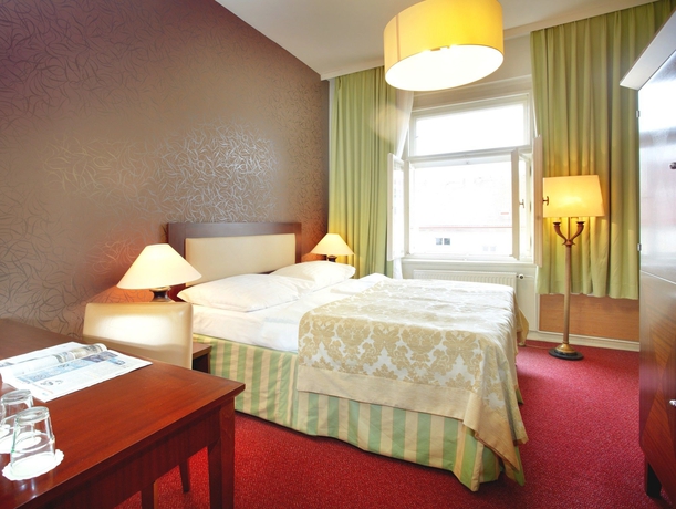 Imagen de la habitación del Hotel BRIXEN, Praga. Foto 7