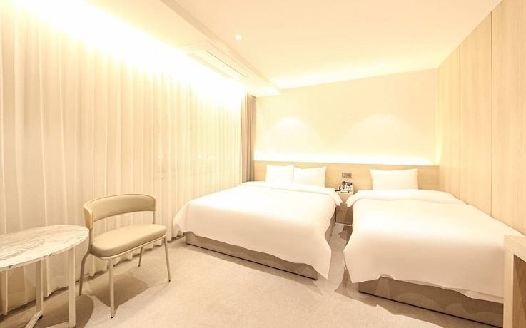 Imagen de la habitación del Hotel BROWN DOT HOTEL. Foto 2