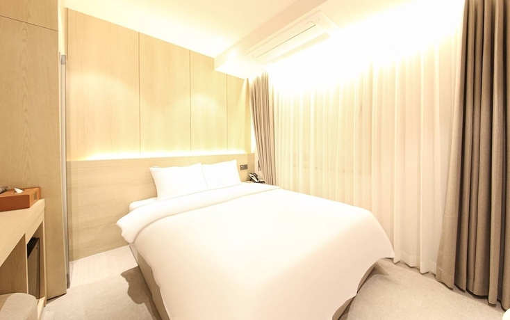 Imagen de la habitación del Hotel BROWN DOT HOTEL. Foto 4