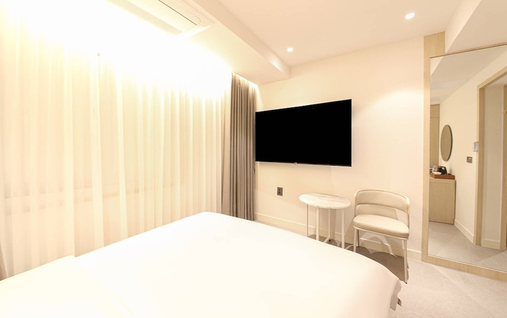 Imagen de la habitación del Hotel BROWN DOT HOTEL. Foto 7