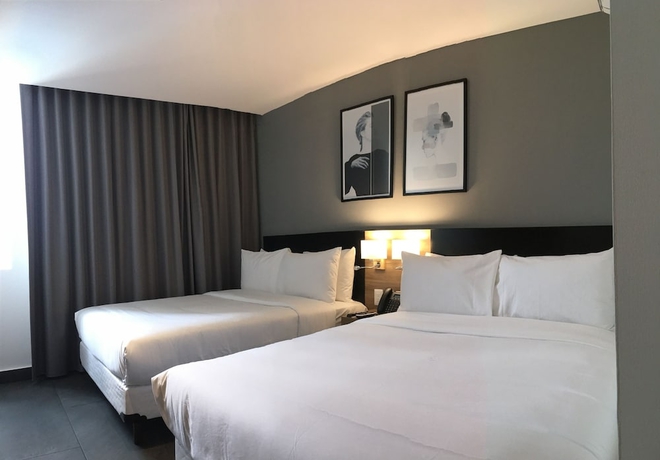 Imagen de la habitación del Hotel B\'S Suites. Foto 5