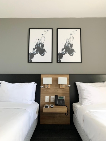 Imagen de la habitación del Hotel B\'S Suites. Foto 15