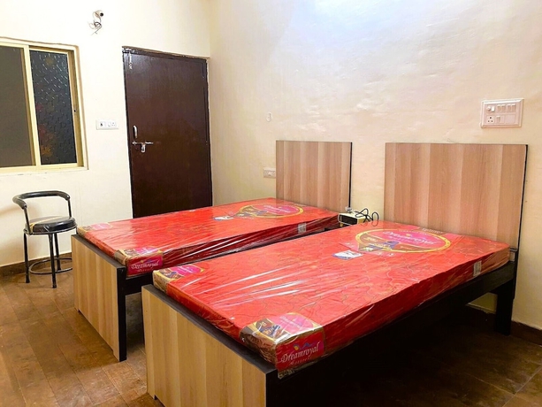 Imagen de la habitación del Hotel BSSN Guest House. Foto 11