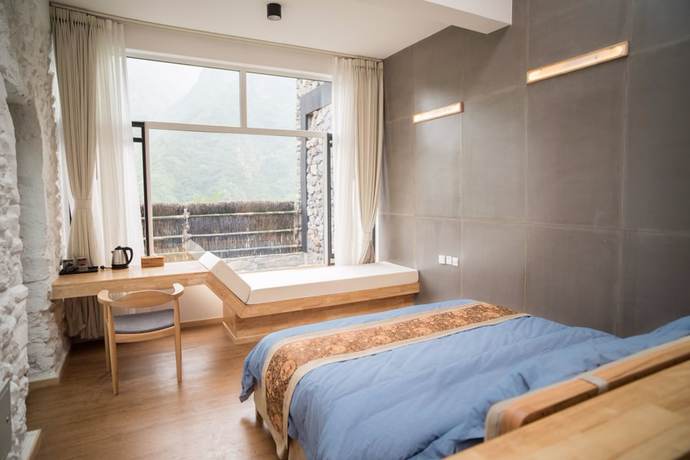 Imagen de la habitación del Hotel BTG Boutique Hotel Tuyu. Foto 5