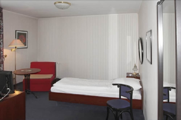 Imagen de la habitación del Hotel BUCHHOLZ. Foto 9