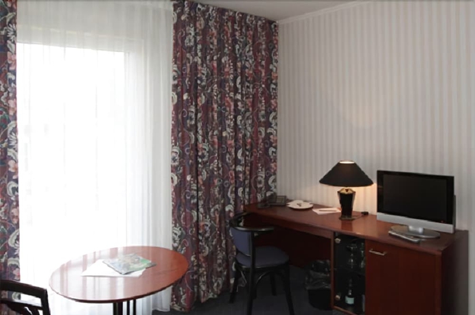 Imagen de la habitación del Hotel BUCHHOLZ. Foto 14