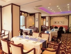 Imagen del bar/restaurante del Hotel BUND HOTEL. Foto 3