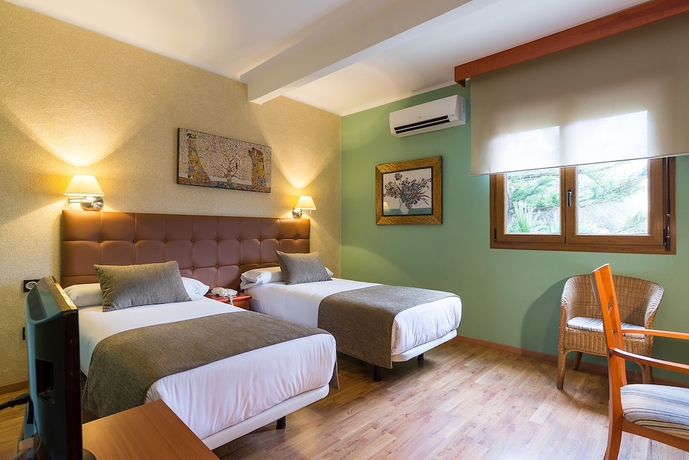 Imagen de la habitación del Hotel BYPILLOW California. Foto 15