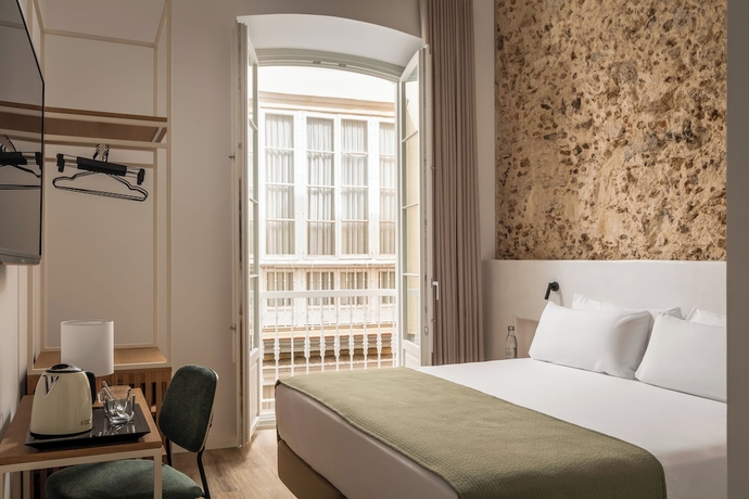 Imagen de la habitación del Hotel BYPILLOW Casa Gades. Foto 2