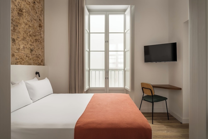 Imagen de la habitación del Hotel BYPILLOW Casa Gades. Foto 8