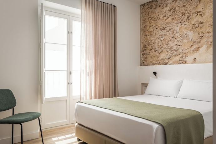 Imagen de la habitación del Hotel BYPILLOW Casa Gades. Foto 15
