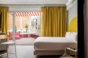 Imagen de la habitación del Hotel BYPILLOW Flamant. Foto 3