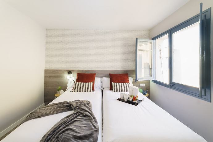 Imagen de la habitación del Hotel BYPILLOW Wander. Foto 11