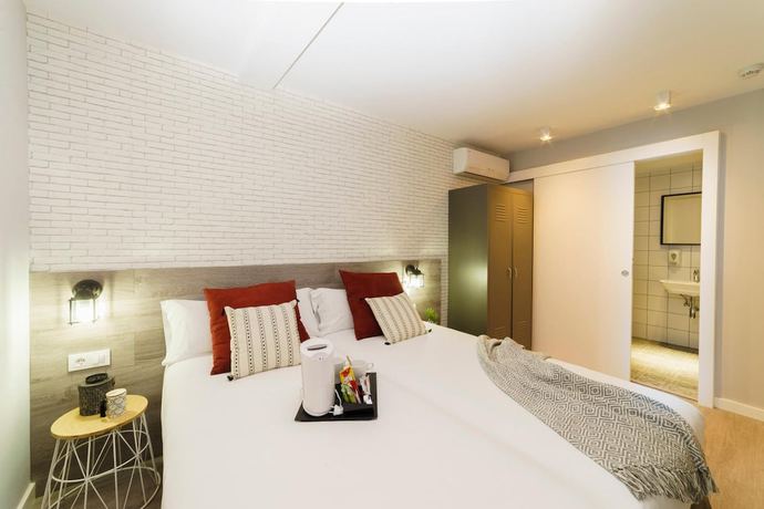 Imagen de la habitación del Hotel BYPILLOW Wander. Foto 14
