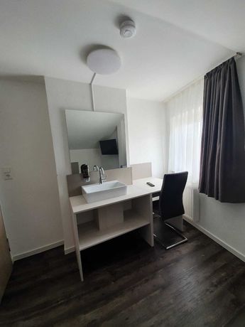 Imagen de la habitación del Hotel BaWü. Foto 12