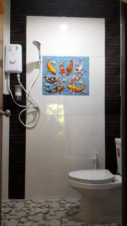 Imagen de la habitación del Hotel Baan Benjathip. Foto 19