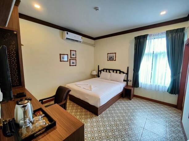 Imagen de la habitación del Hotel Baan Chao Khun. Foto 16