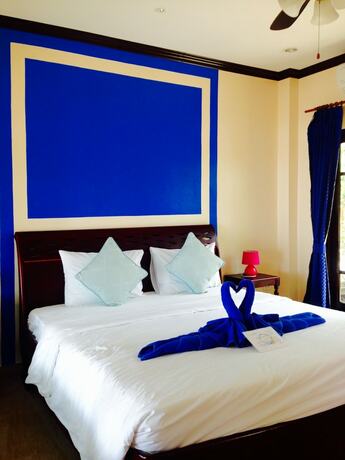 Imagen de la habitación del Hotel Baan Faa Talaychan Resort. Foto 19