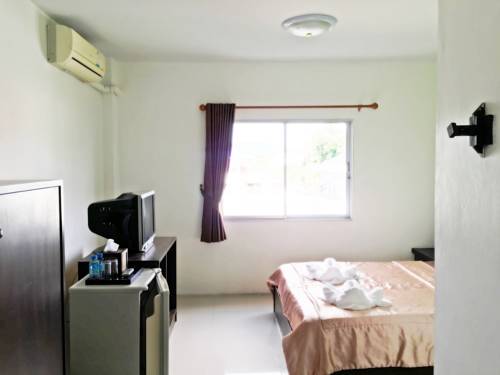 Imagen de la habitación del Hotel Baan Kanta. Foto 8