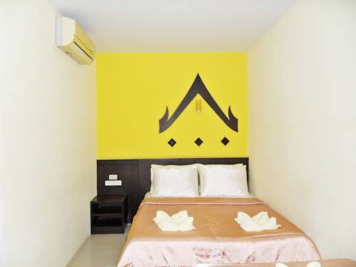 Imagen de la habitación del Hotel Baan Kanta. Foto 9