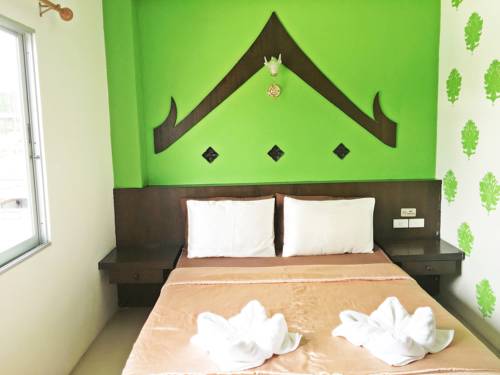 Imagen de la habitación del Hotel Baan Kanta. Foto 11