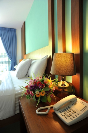 Imagen de la habitación del Hotel Baan Karon Resort. Foto 11