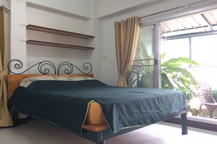 Imagen de la habitación del Hotel Baan Khun Mae Apartment. Foto 7