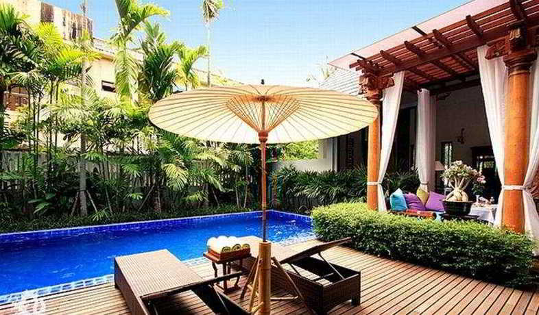 Imagen de la piscina del Hotel Baan Klang Wiang Boutique Hotel Chiang Mai. Foto 11