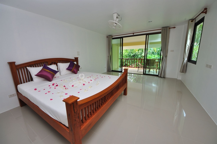Imagen de la habitación del Hotel Baan Mai Beachfront Phuket Lone Island. Foto 9