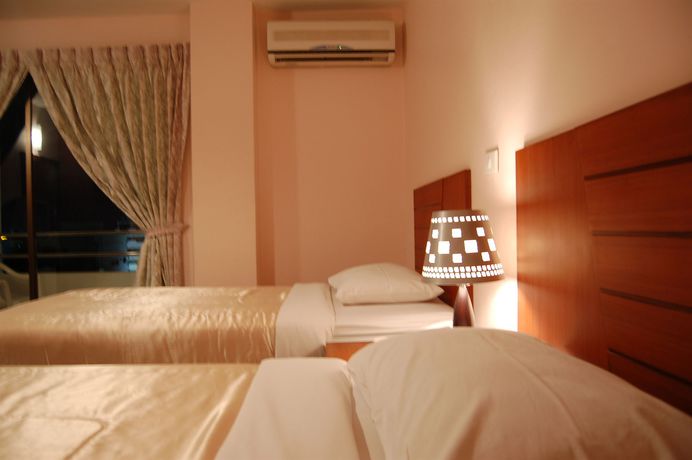 Imagen de la habitación del Hotel Baan Manthana House. Foto 8