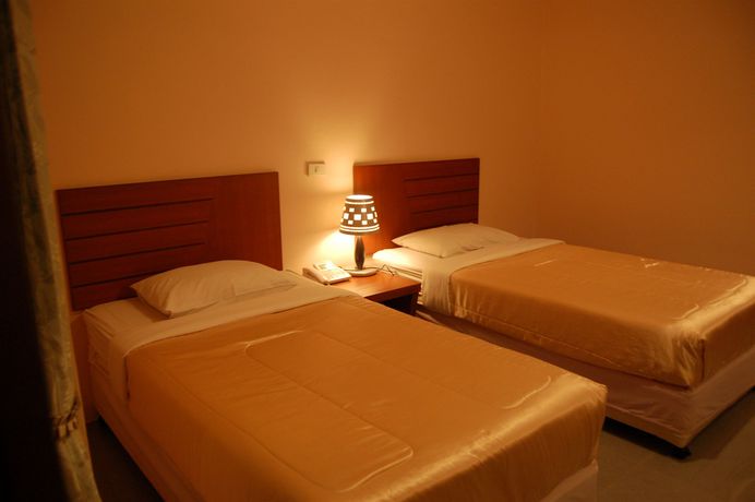 Imagen de la habitación del Hotel Baan Manthana House. Foto 9