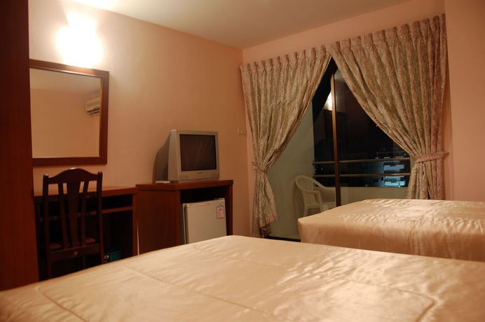 Imagen de la habitación del Hotel Baan Manthana House. Foto 10