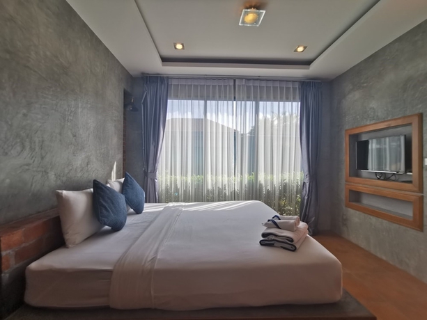 Imagen de la habitación del Hotel Baan Mee Phuket. Foto 10