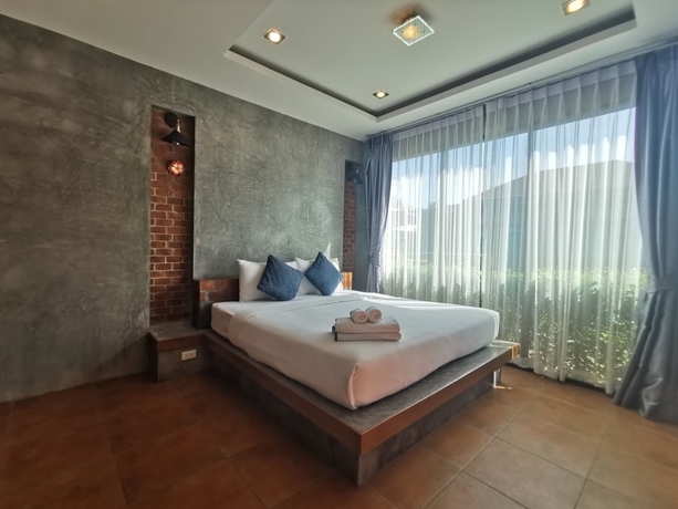 Imagen de la habitación del Hotel Baan Mee Phuket. Foto 12