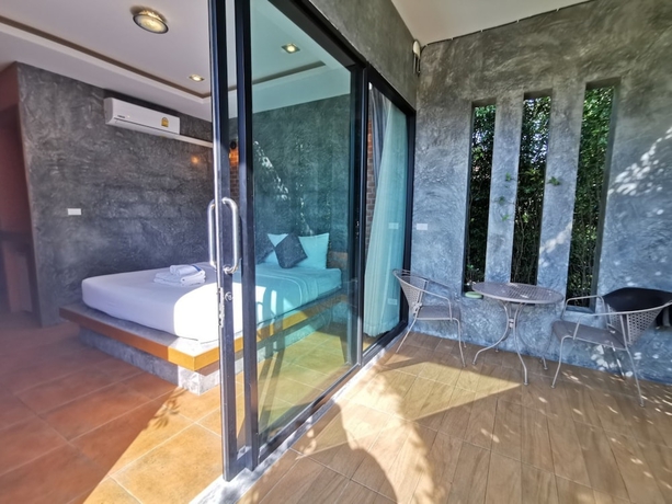 Imagen de la habitación del Hotel Baan Mee Phuket. Foto 14