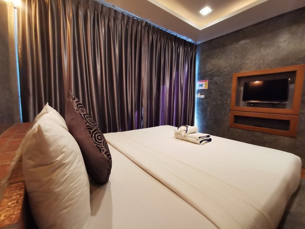 Imagen de la habitación del Hotel Baan Mee Phuket. Foto 16