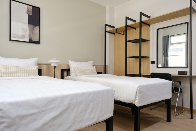 Imagen de la habitación del Hotel Baan Noppadol. Foto 7