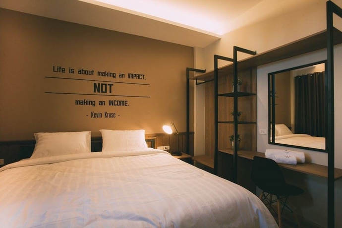 Imagen de la habitación del Hotel Baan Noppadol. Foto 8