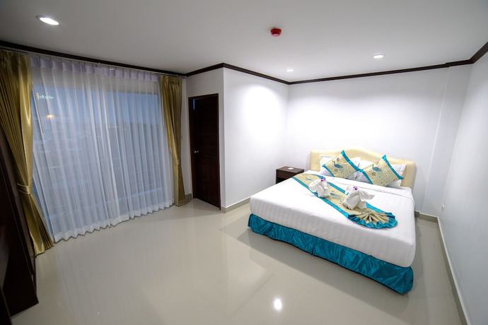 Imagen de la habitación del Hotel Baan Pattamaporn. Foto 6