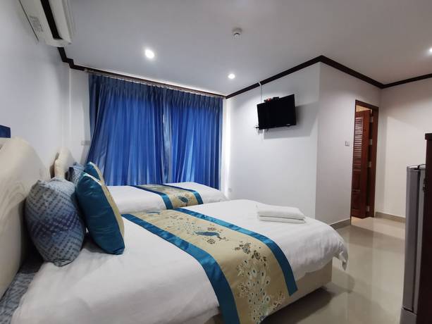 Imagen de la habitación del Hotel Baan Pattamaporn. Foto 16