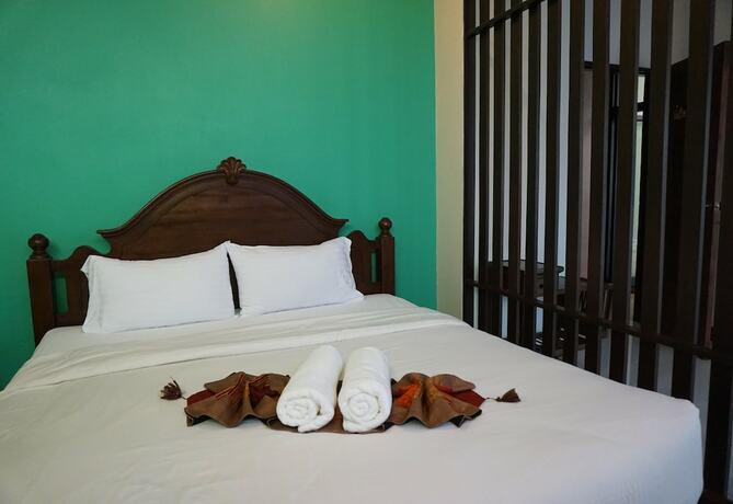 Imagen de la habitación del Hotel Baan Plubthong. Foto 13