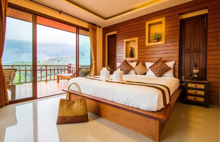 Imagen de la habitación del Hotel Baan Puteri Lanta Villa. Foto 19