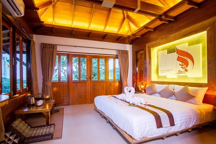 Imagen de la habitación del Hotel Baan Puteri Lanta Villa. Foto 20